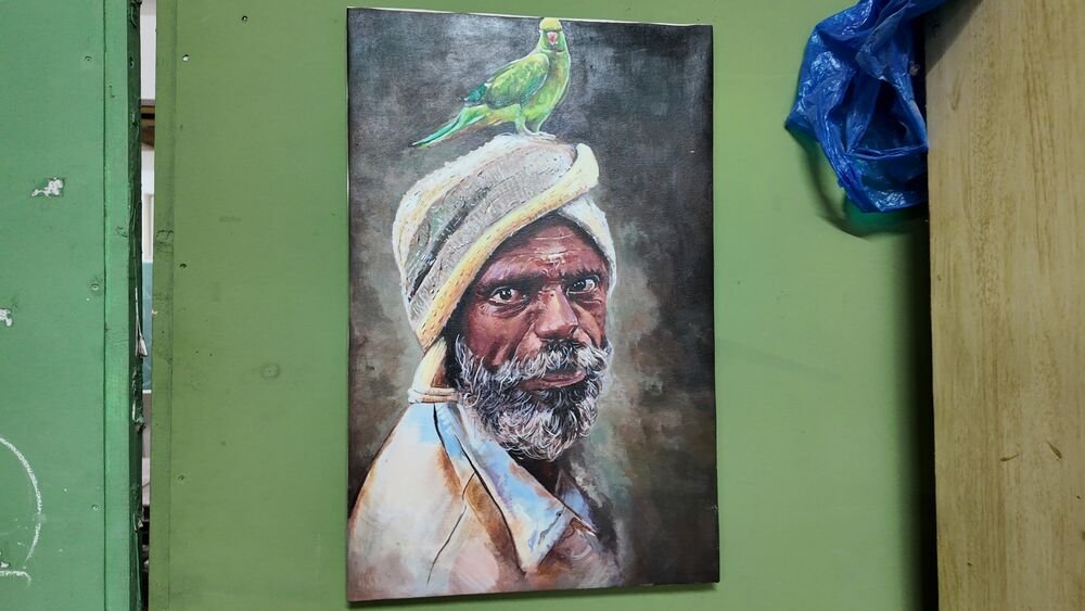 A painted portrait in the painting studio.