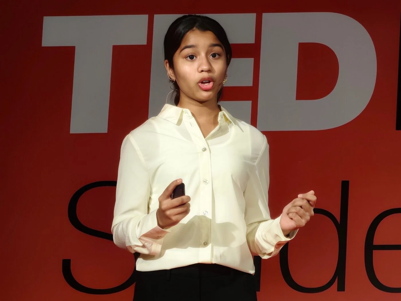 A student giving her talk on the TED-Ed Student Talks stage.
